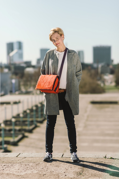 Orange leather bag by designer Stella Soomlais photo Tõnu Tunnel